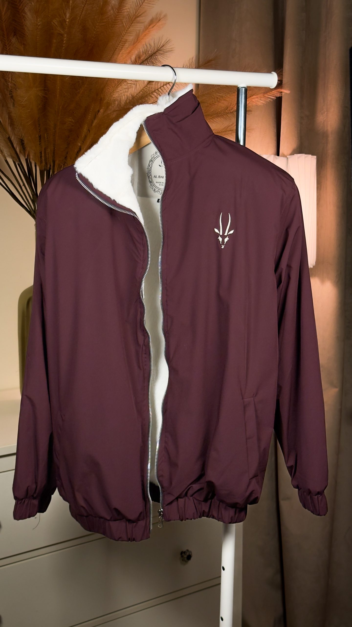 جاكيت الوكرة عنابي ضد المطر